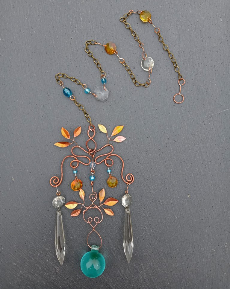 Suncatcher with copper leaves, vintage crystals and big glass bead Suncatcher with copper leaves, vintage crystals and big glass bead