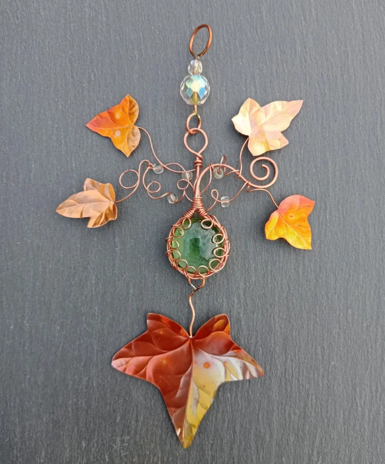 SOLD – copper ivy leaves with copper wire wrapped green glass SOLD - copper ivy leaves with copper wire wrapped green glass