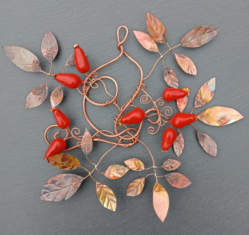 Handmade, one off copper leaves with rose hips